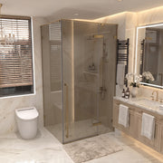 45.6"–46" W (Adjustable Width) x 79" H Frameless Reversible Pivot Shower Door in Brushed Gold with Brown Tinted Glass and 34.1"–34.5" Side Panel